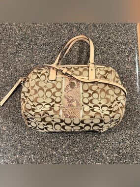 Coach brown and tan purse with snake print small flaws